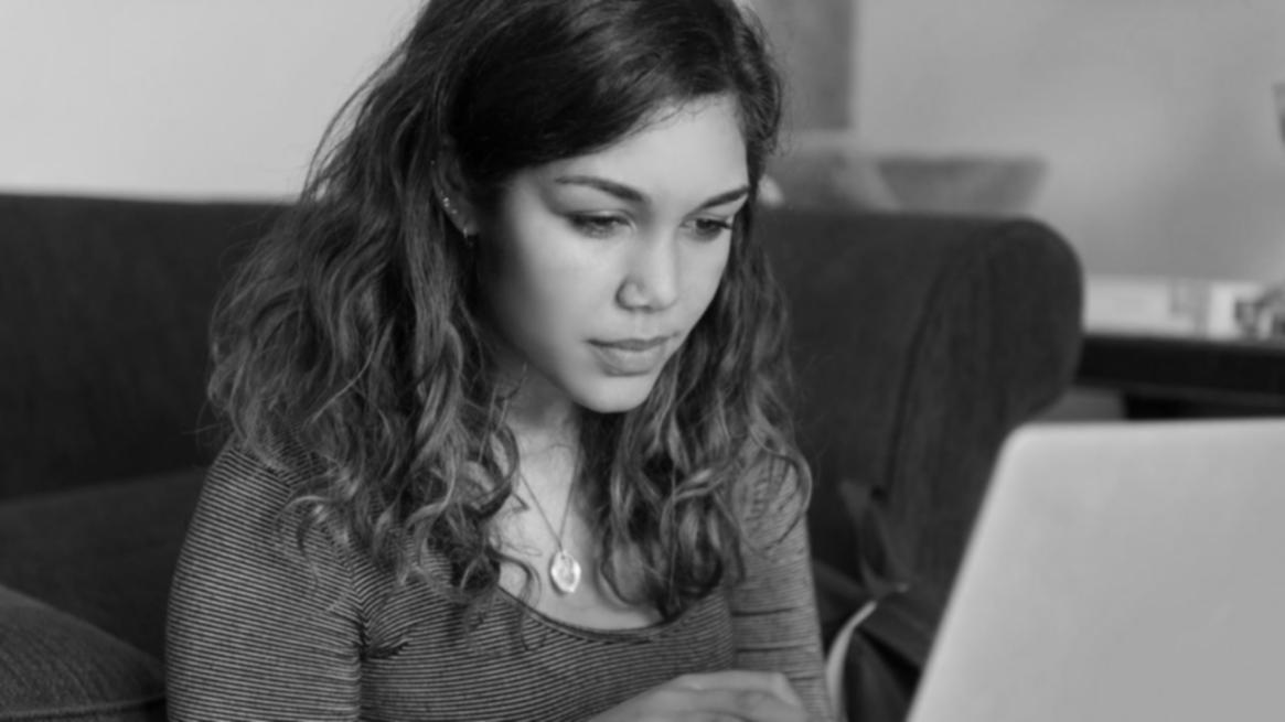 Instructor reviewing student code submissions